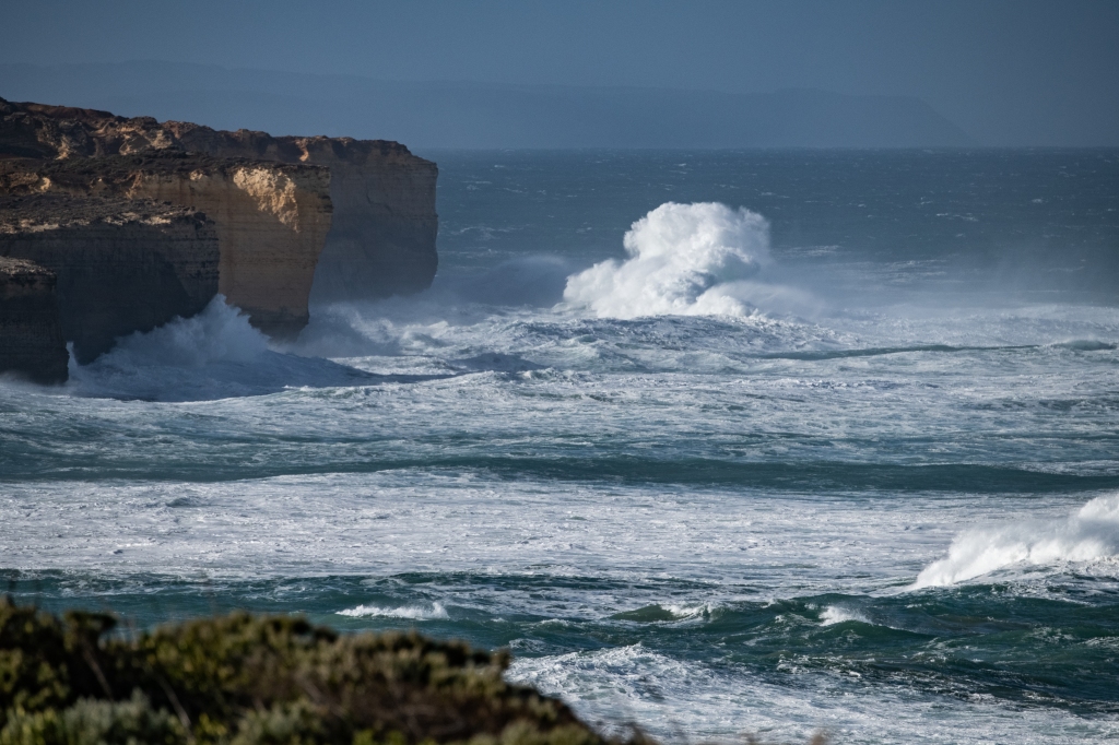 Wild surf breaking under the cliffs between Port Campbell and Peterborough 