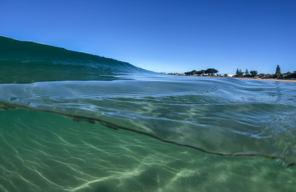 Underwater and overwater view of wave about to break at Apollo Bay